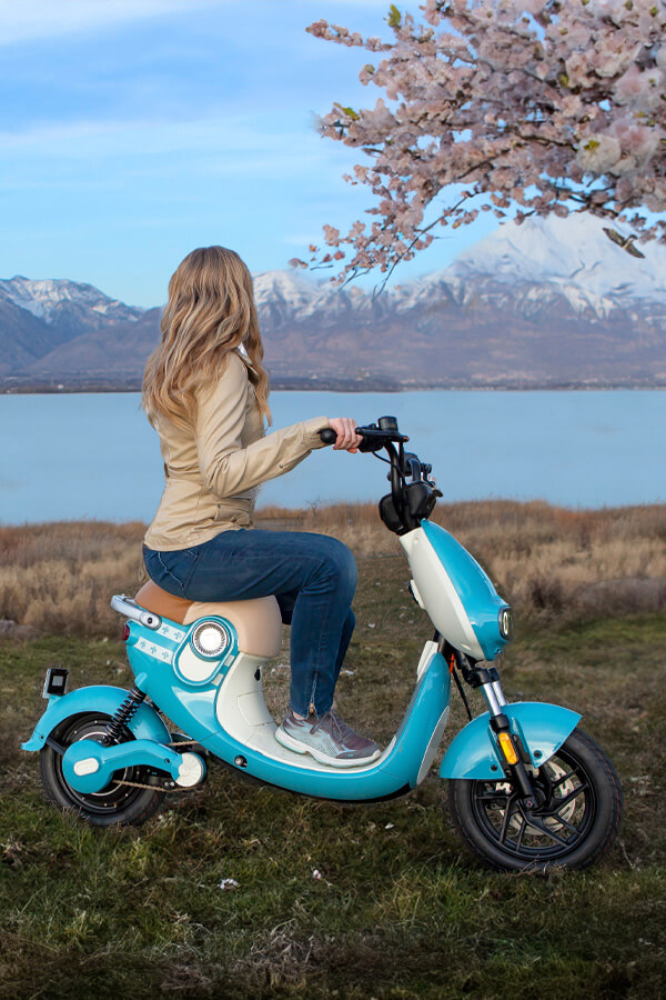 Girl and blue scooter